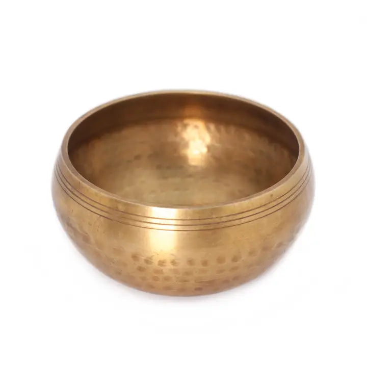 Hammer Beating Singing Bowl