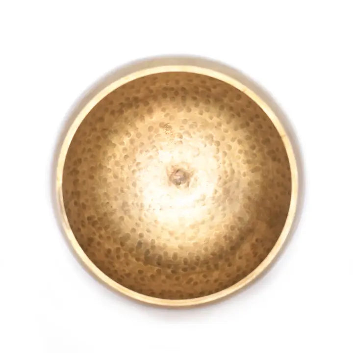 Hammer Beating Singing Bowl