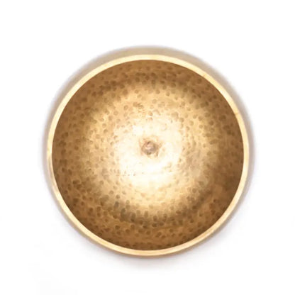 Hammer Beating Singing Bowl