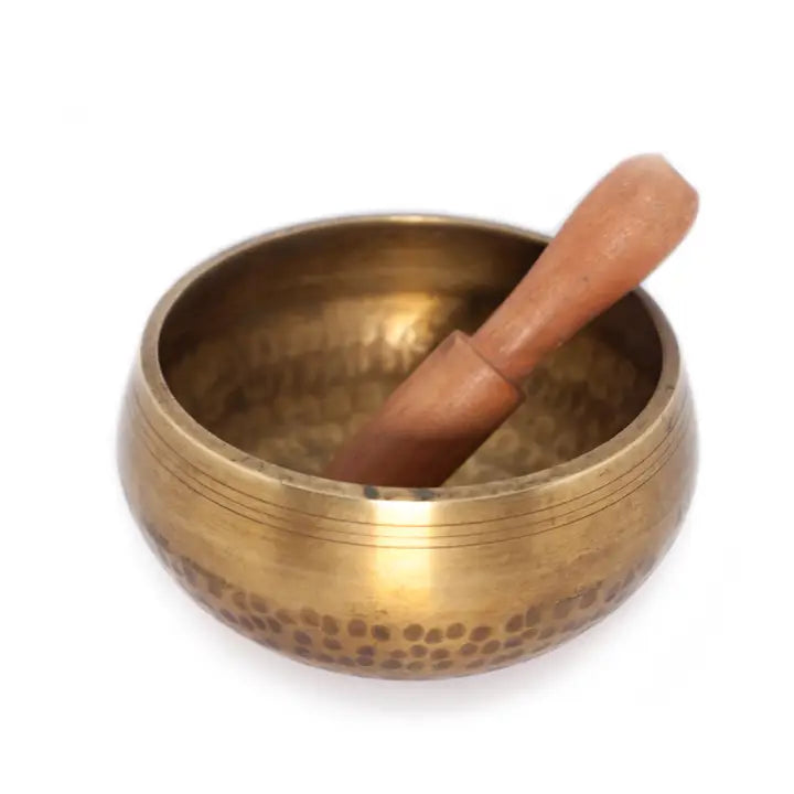 Hammer Beating Singing Bowl