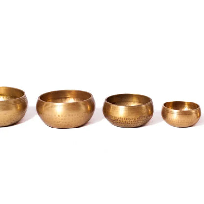 Hammer Beating Singing Bowl